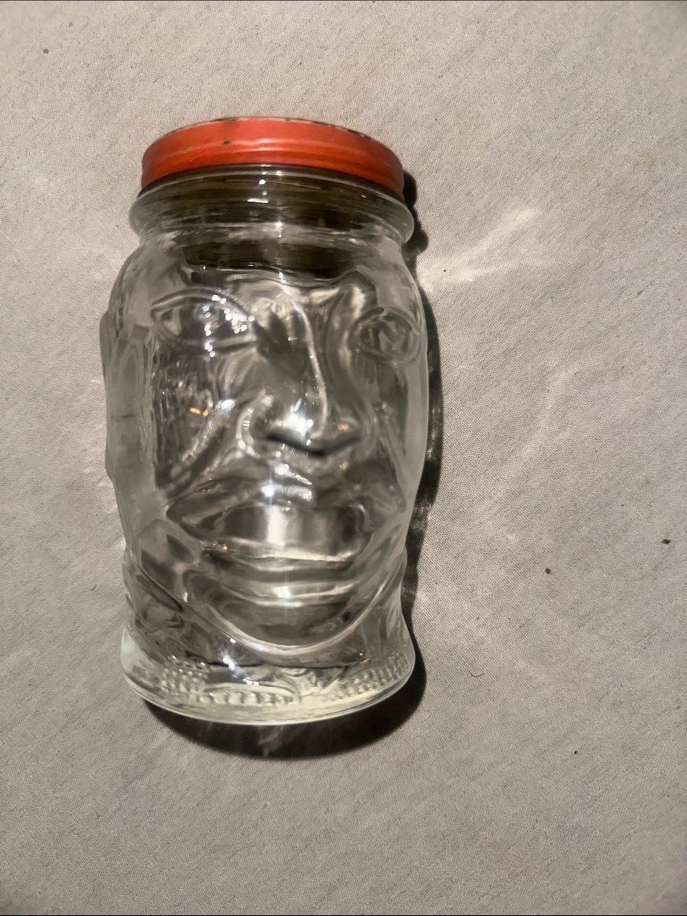 Vintage Collectible Glass Face Jar with Orange Lid - Decorative Home Art